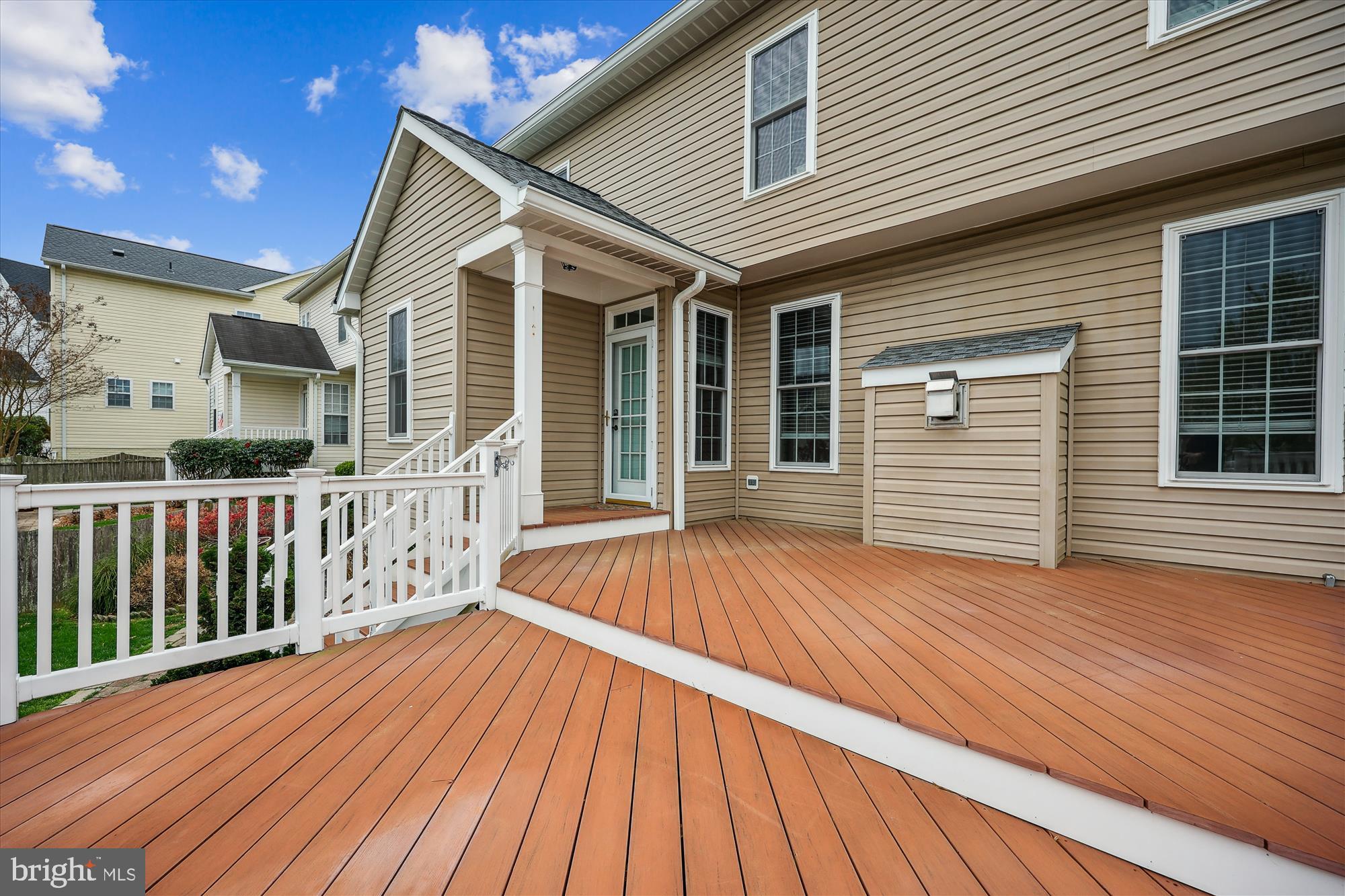 18301 Beechnut Way Boyds, MD 20841 - Photo 23 of 72 a view of a house with a roof deck