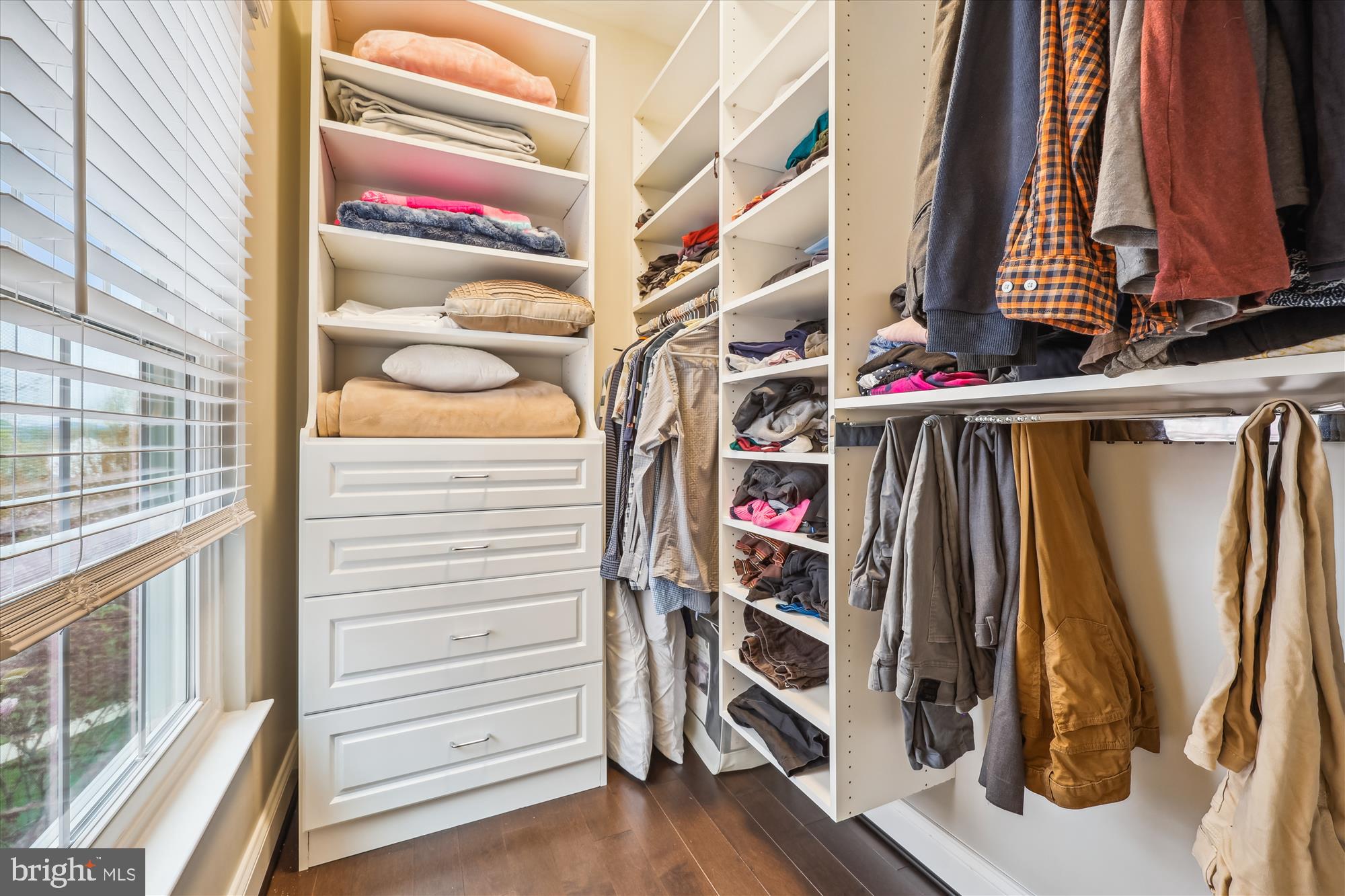 18301 Beechnut Way Boyds, MD 20841 - Photo 29 of 72 a view of walk in closet with clothes