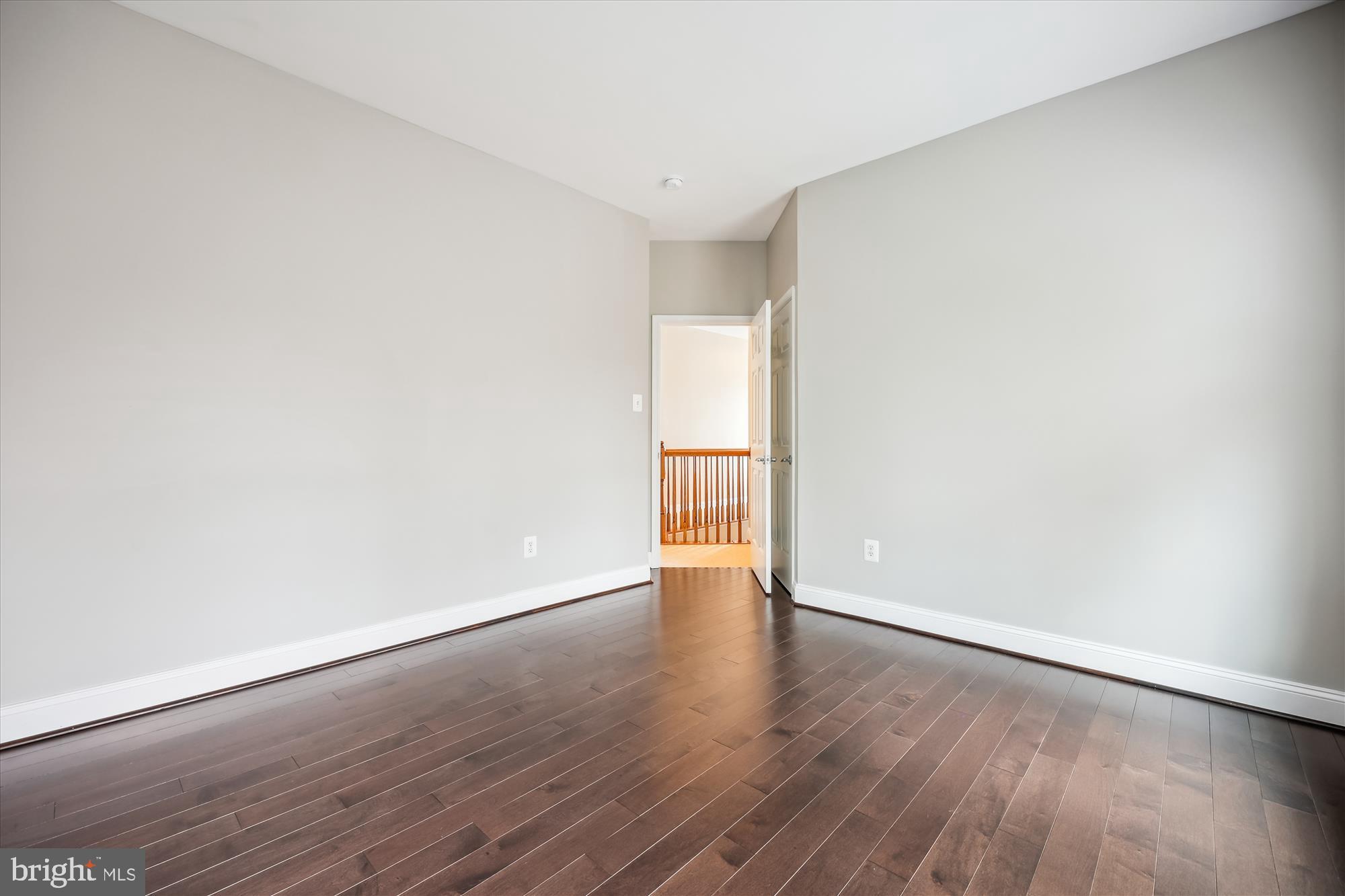 18301 Beechnut Way Boyds, MD 20841 - Photo 35 of 72 an empty room with wooden floor