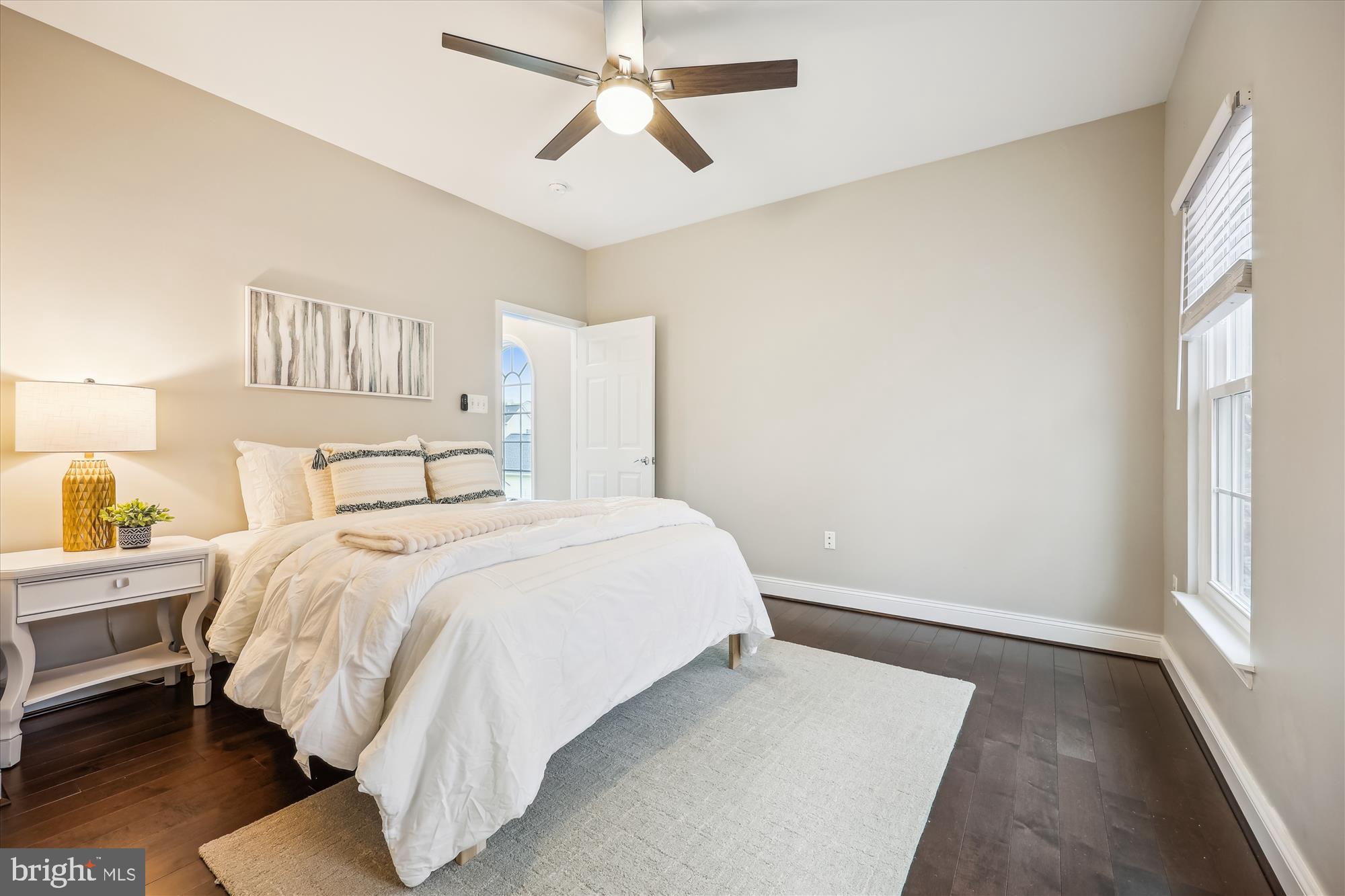 18301 Beechnut Way Boyds, MD 20841 - Photo 38 of 72 a bedroom with a bed wooden floor and window