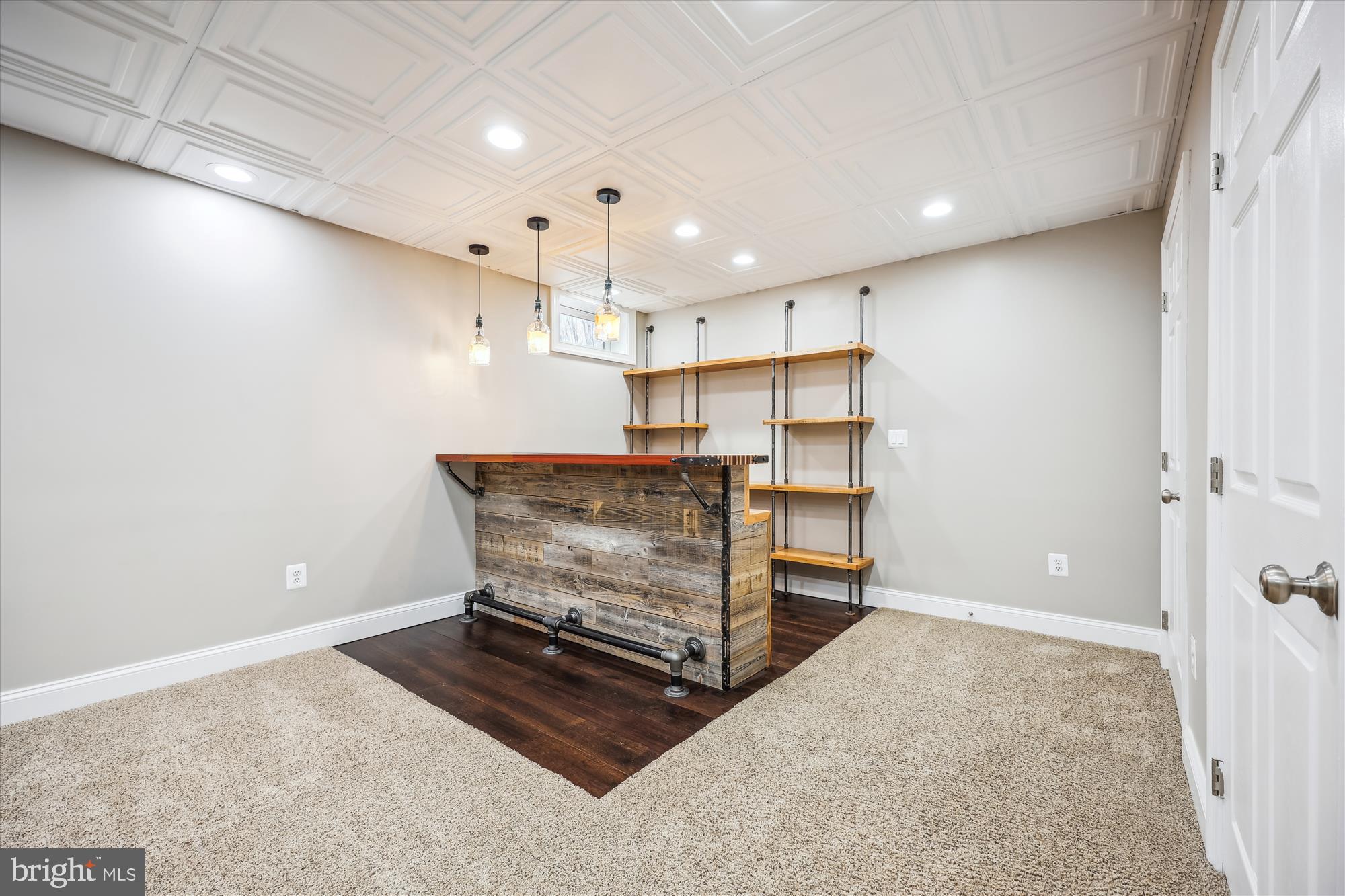 18301 Beechnut Way Boyds, MD 20841 - Photo 44 of 72 a room with furniture and a flat screen tv