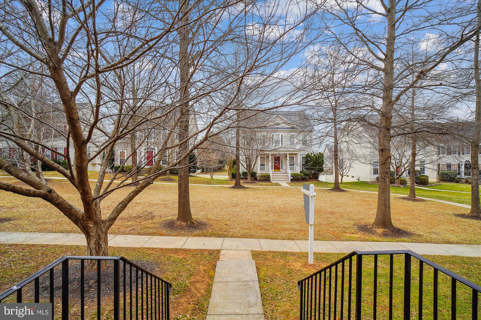 18301 Beechnut Way Boyds, MD 20841 - Photo 59 of 72 a view of swimming pool with an outdoor seating