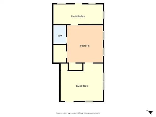 an aerial view of residential building with yard