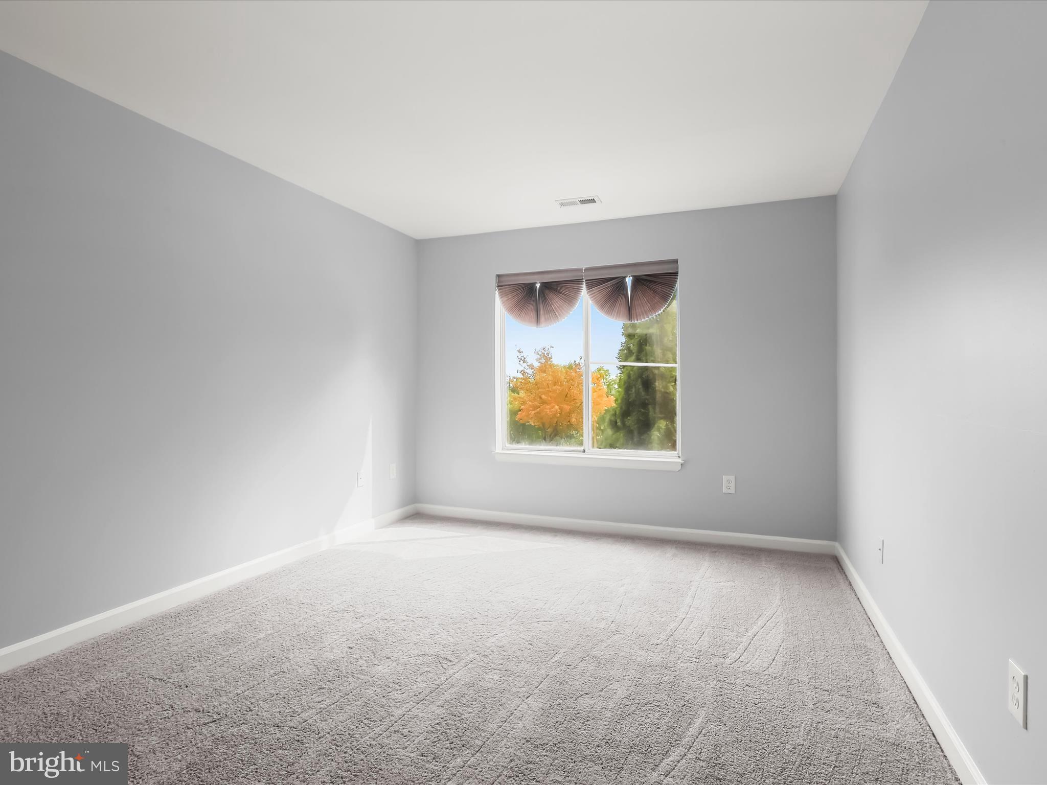 6708 Ridge Road, Unit 204 Baltimore, MD 21237 - Photo 19 of 31 Primary Bedroom Suite