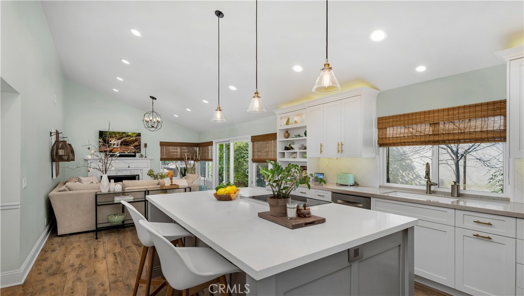6 Mallard Irvine, CA 92604 - Photo 18 of 45 a kitchen with counter space appliances and a center island