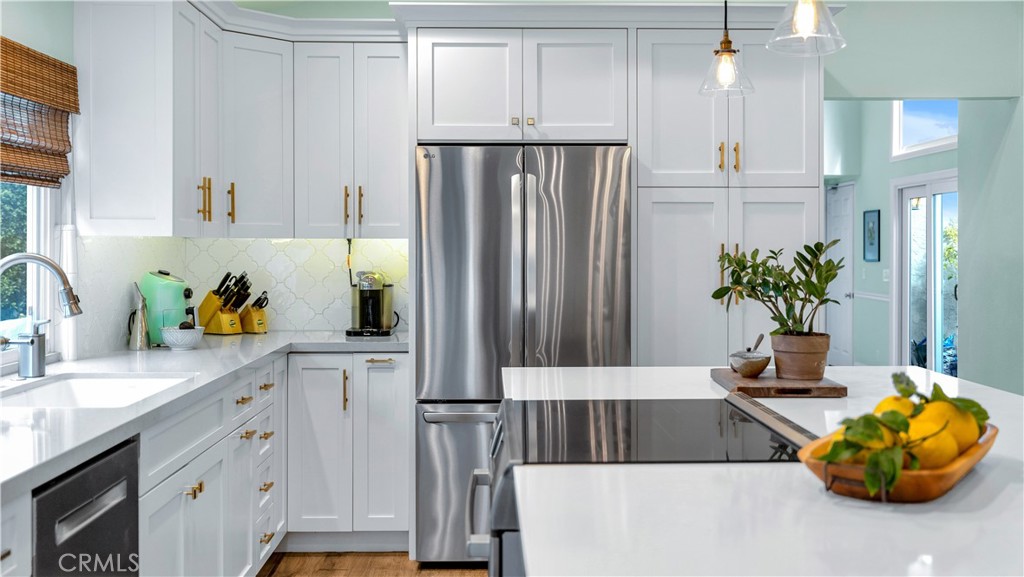 6 Mallard Irvine, CA 92604 - Photo 22 of 45 a kitchen with cabinets and window
