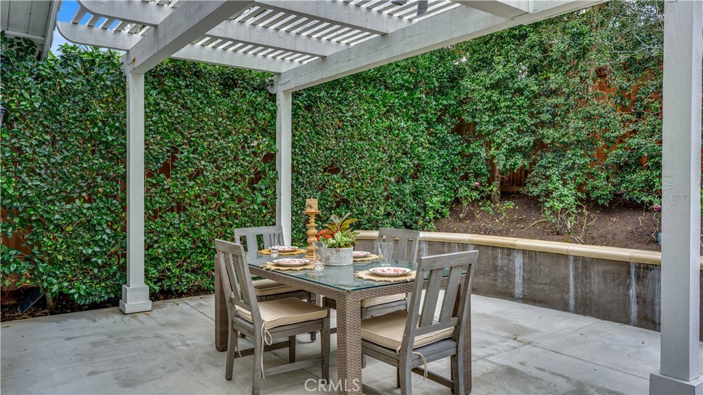 6 Mallard Irvine, CA 92604 - Photo 38 of 45 a view of an outdoor space with a table and chairs