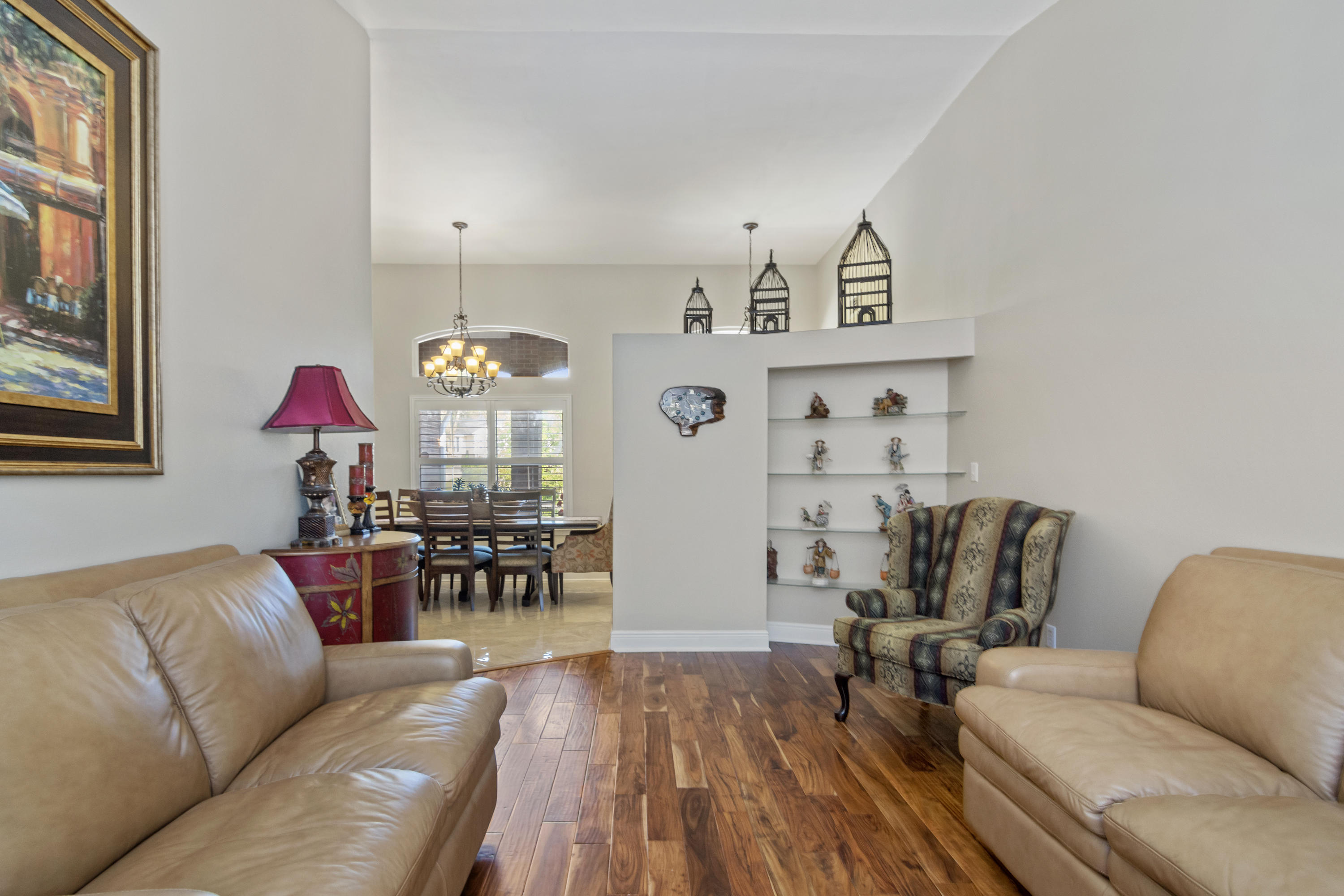 5766 Wildwood Road Crestview, FL 32536 - Photo 17 of 45 a living room with furniture and wooden floor