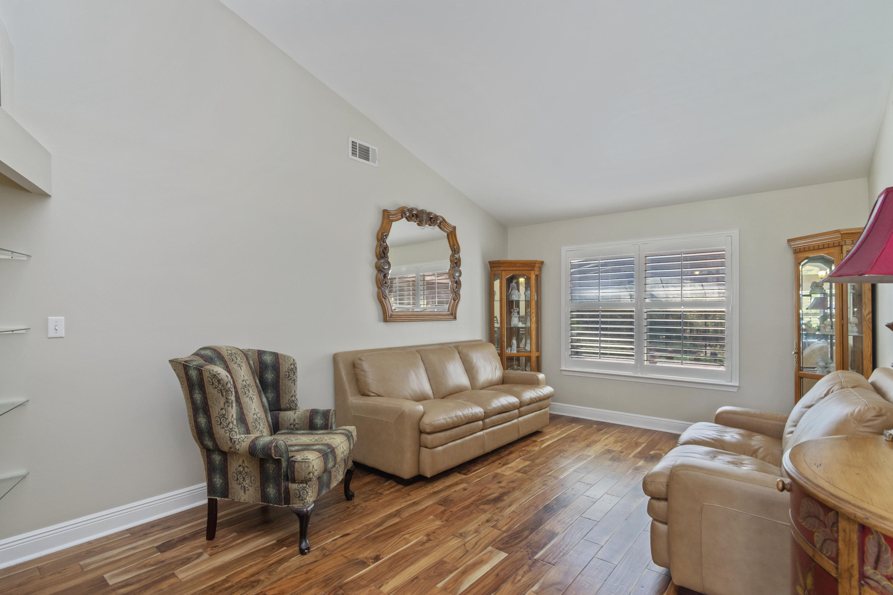 5766 Wildwood Road Crestview, FL 32536 - Photo 18 of 45 a living room with furniture and a window