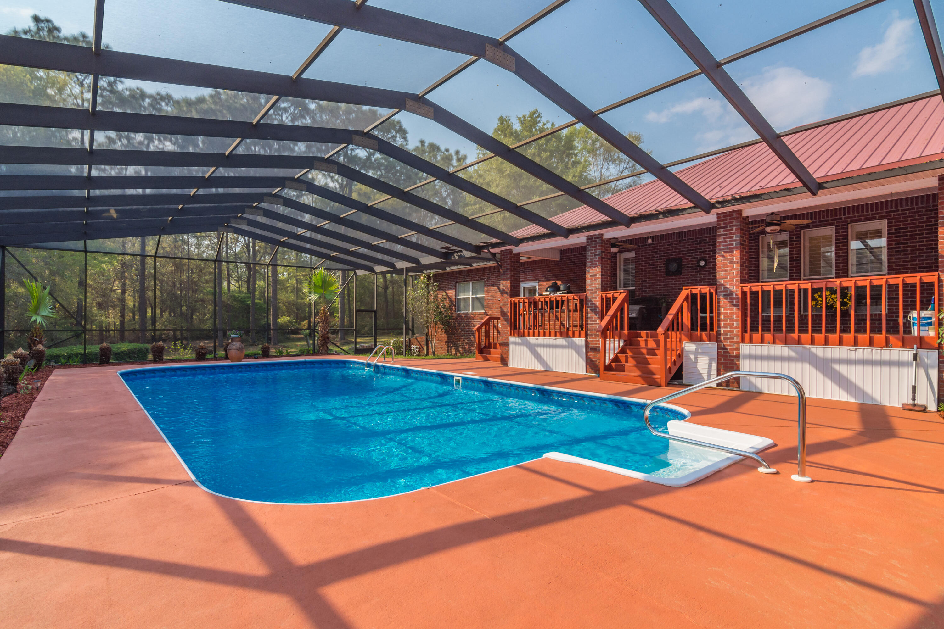 5766 Wildwood Road Crestview, FL 32536 - Photo 2 of 45 a view of a backyard