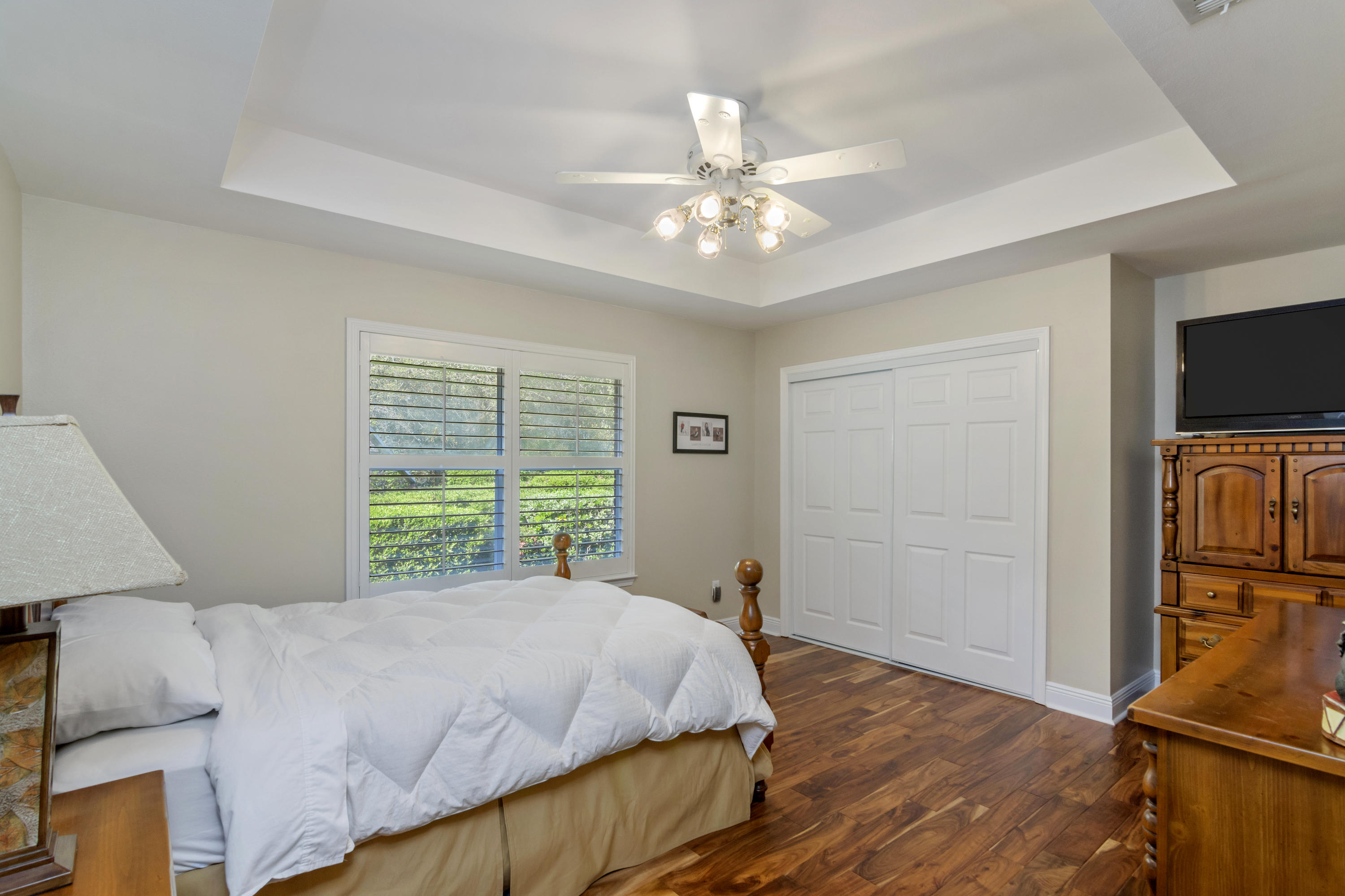 5766 Wildwood Road Crestview, FL 32536 - Photo 30 of 45 a bed sitting in a bedroom next to a window