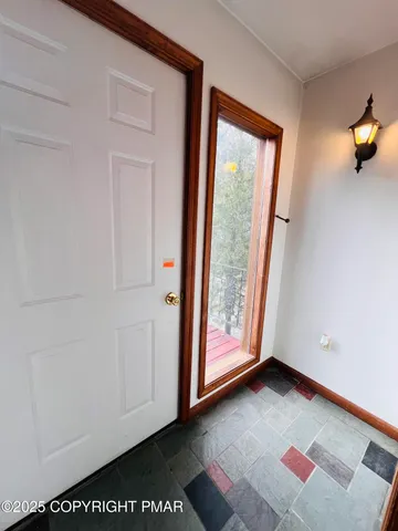 an entryway with an outdoor space