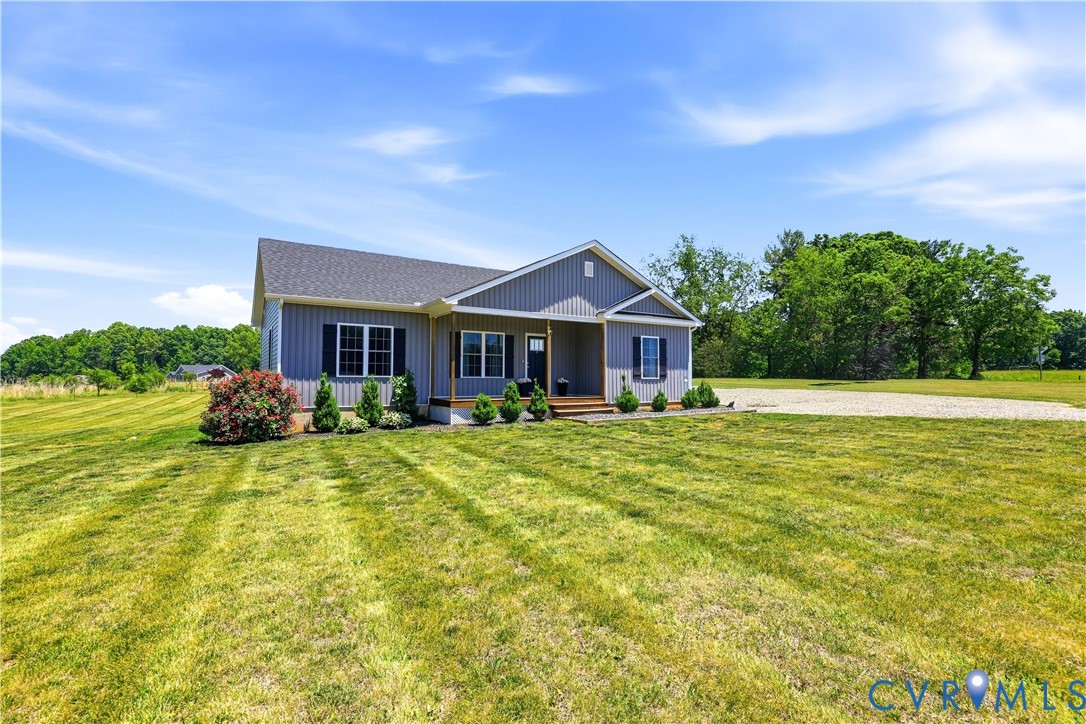 235 Stoney Point Road Cumberland, VA 23040 - Photo 3 of 35 a front view of a house with a yard