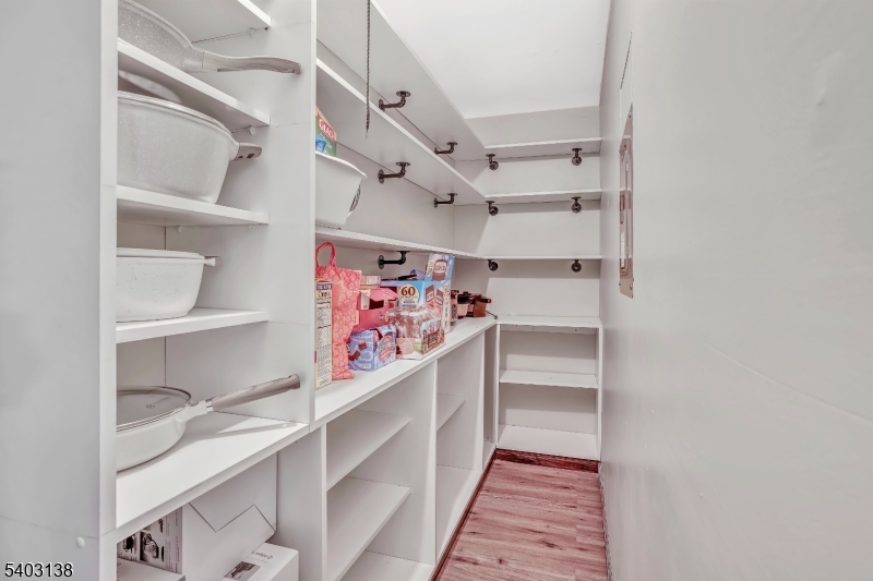 1475 Mt Holly Road, Unit 4 Edgewater Park, NJ 08010 - Photo 12 of 18 a view of walk in closet with clothes and shoes