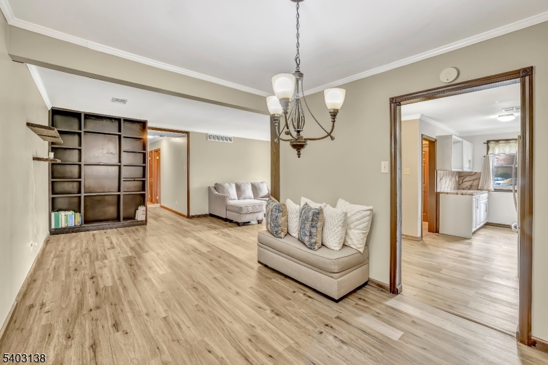 1475 Mt Holly Road, Unit 4 Edgewater Park, NJ 08010 - Photo 5 of 18 a living room with furniture and wooden floor