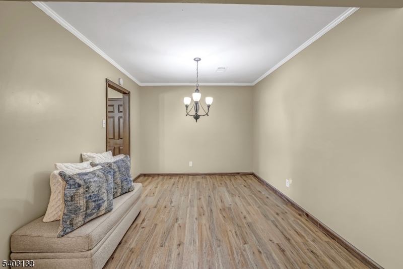 1475 Mt Holly Road, Unit 4 Edgewater Park, NJ 08010 - Photo 8 of 18 a living room with furniture and wooden floor