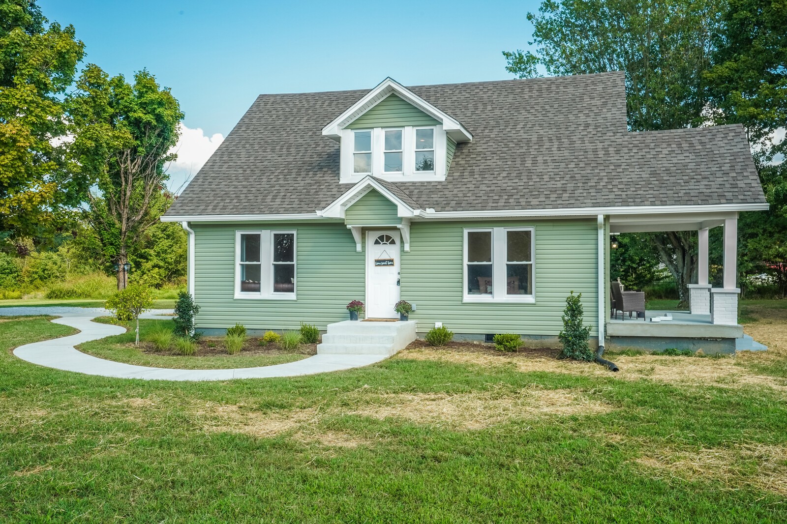 150 Absher Road Portland, TN 37148 - Photo 13 of 37 a front view of a house with a yard