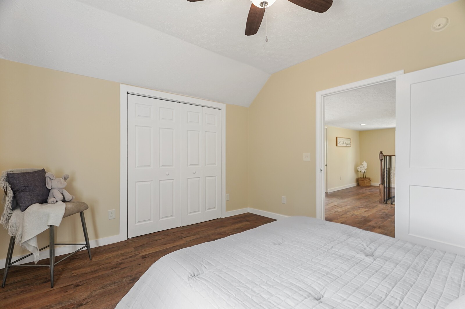 150 Absher Road Portland, TN 37148 - Photo 26 of 37 a bedroom with a bed and wooden floor