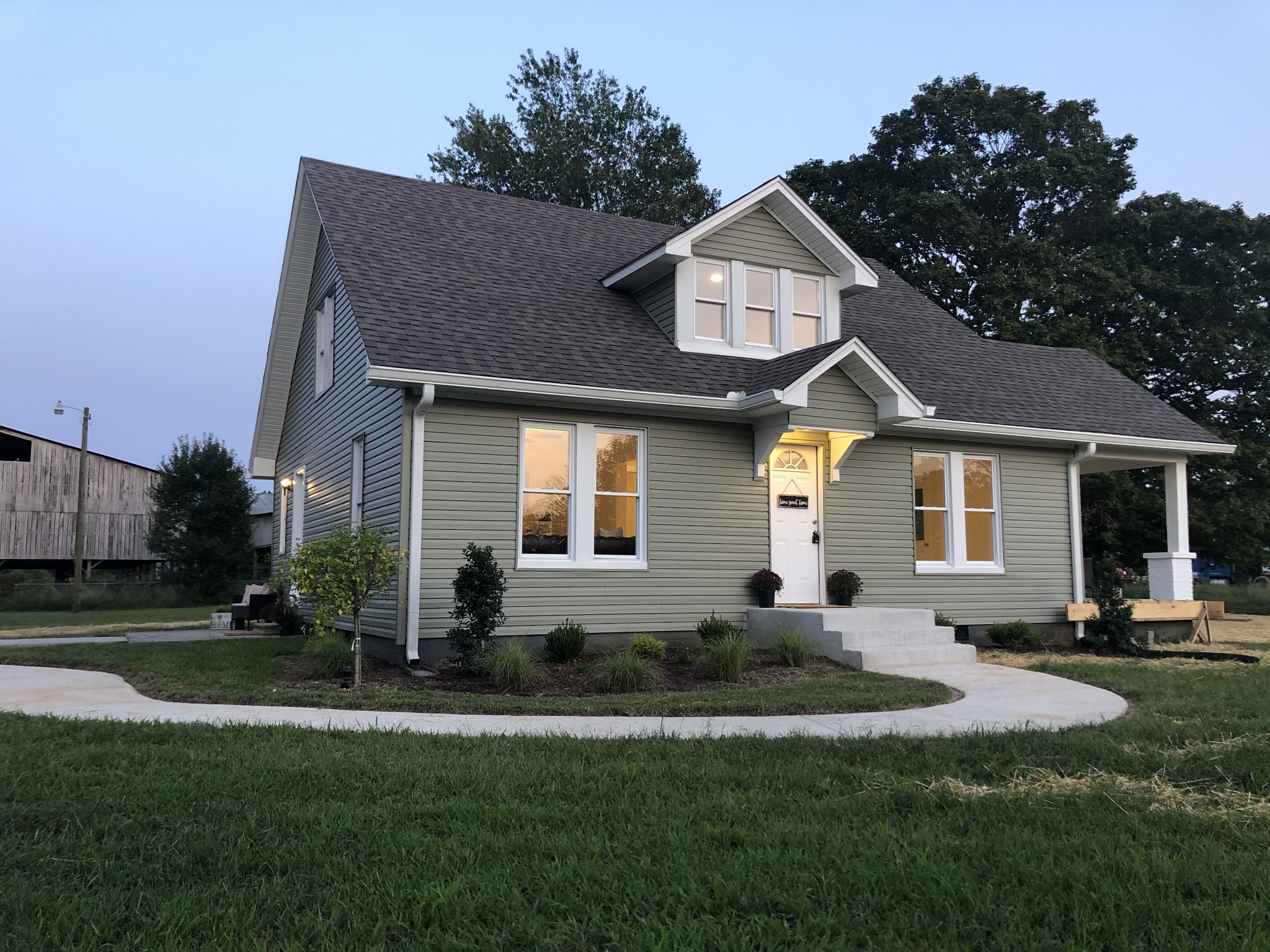150 Absher Road Portland, TN 37148 - Photo 34 of 37 a front view of a house with a yard