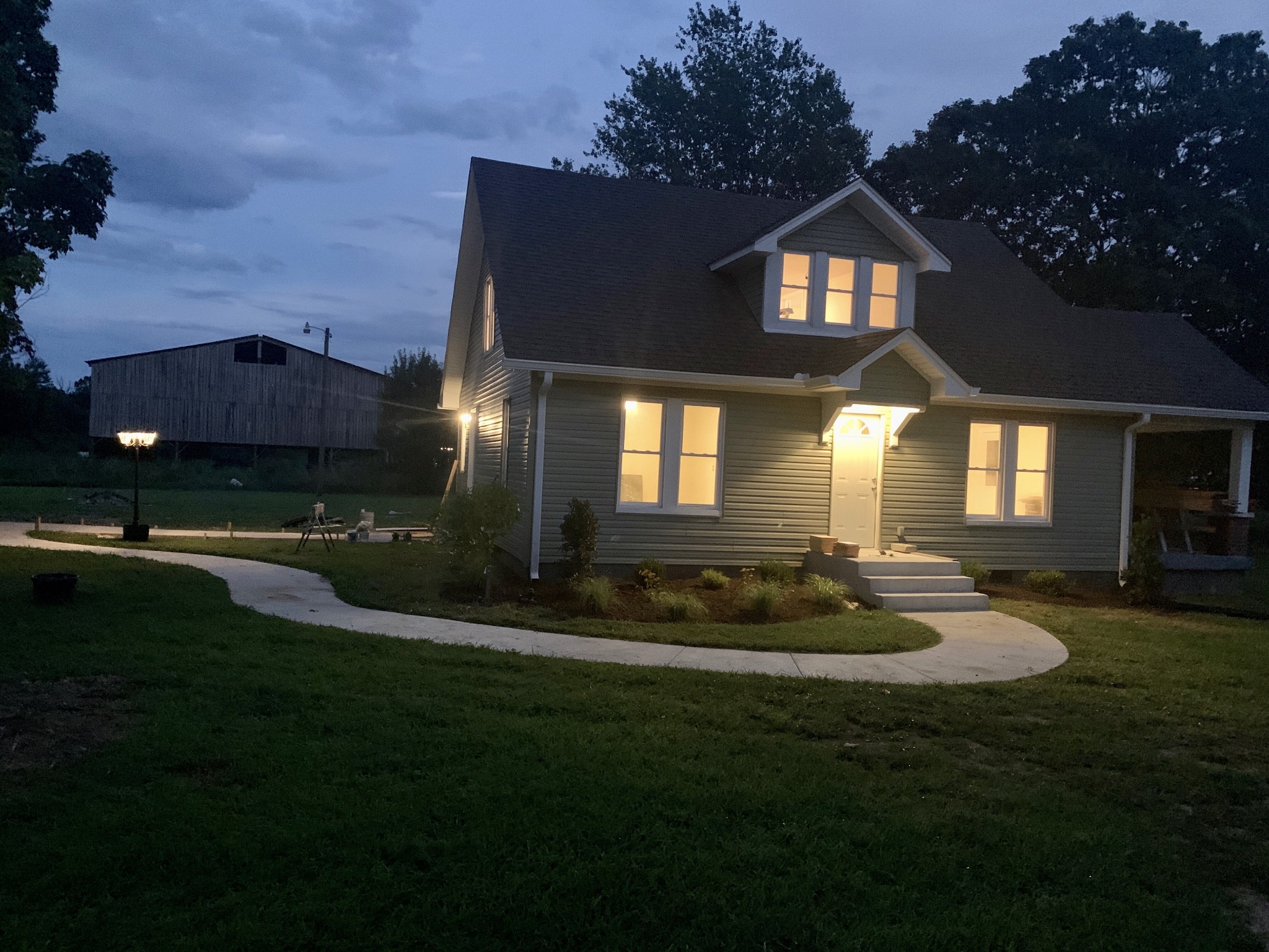 150 Absher Road Portland, TN 37148 - Photo 36 of 37 a front view of a house with a yard
