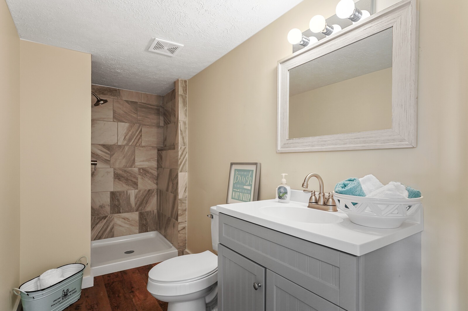 150 Absher Road Portland, TN 37148 - Photo 7 of 37 a bathroom with a sink toilet a mirror and shower