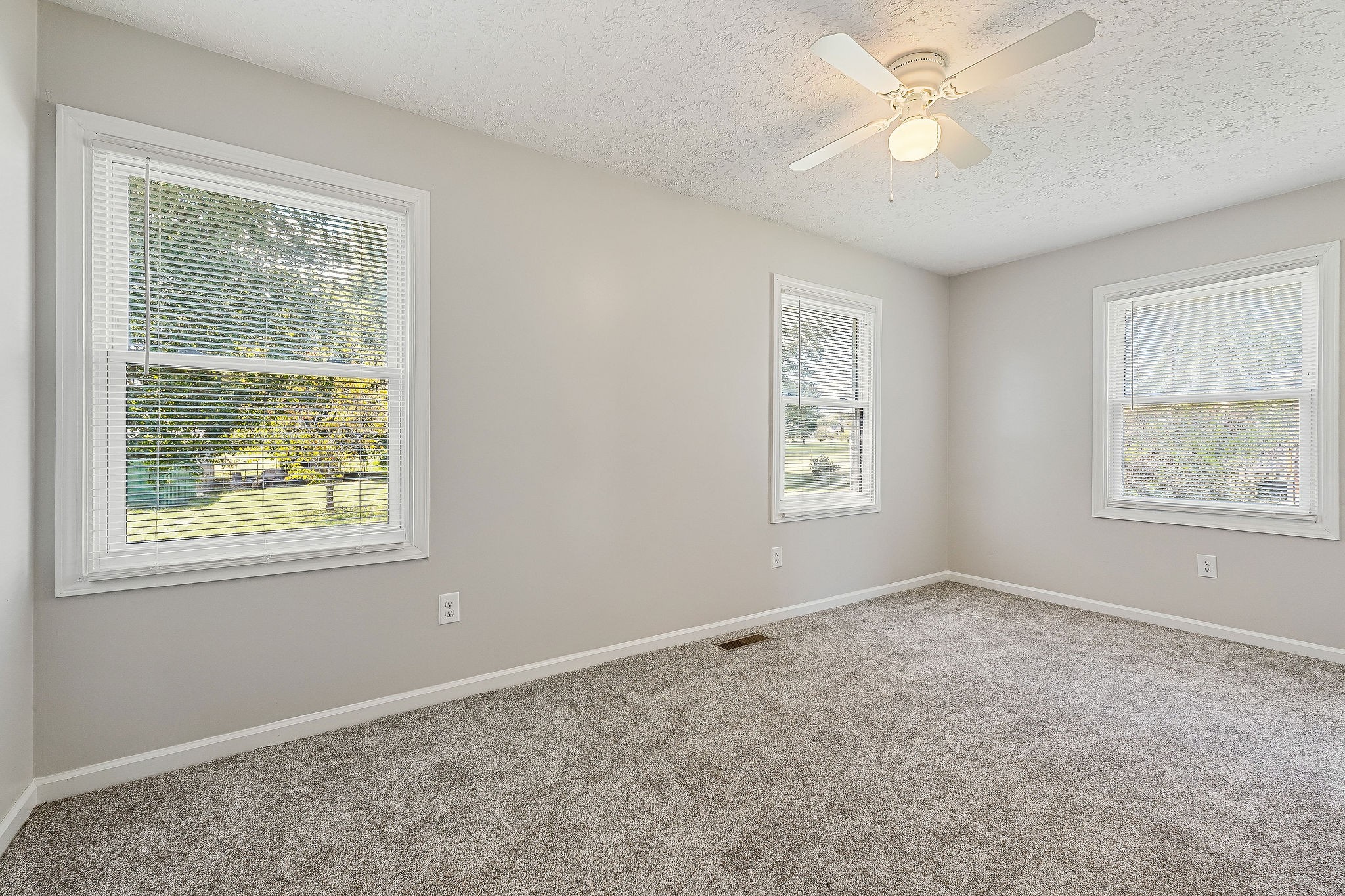 609 Dry Creek Road Smithville, TN 37166 - Photo 16 of 20 a view of an empty room with a window