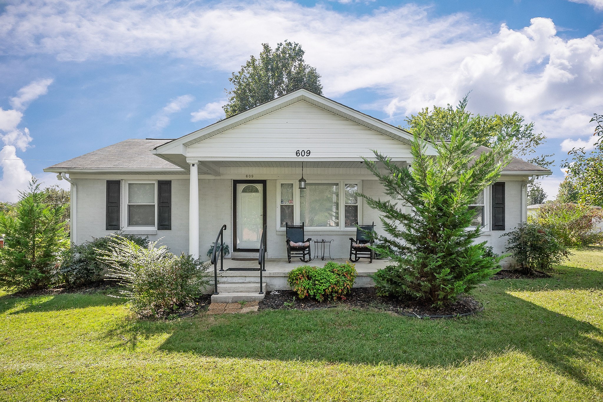 609 Dry Creek Road Smithville, TN 37166 - Photo 3 of 20 a front view of a house with a yard
