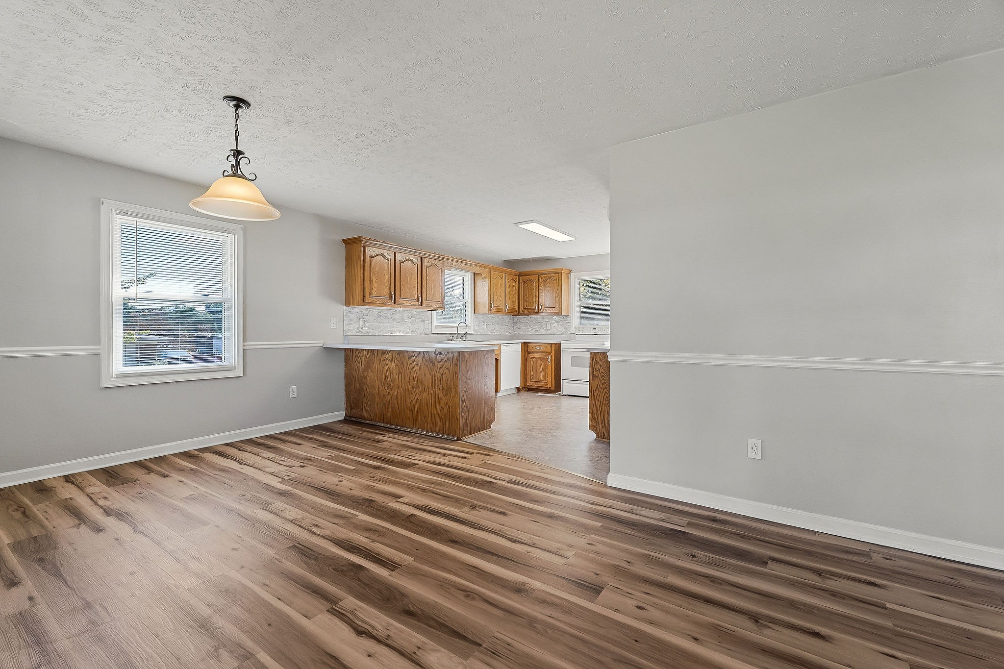 609 Dry Creek Road Smithville, TN 37166 - Photo 9 of 20 a view of a room wooden floor and windows