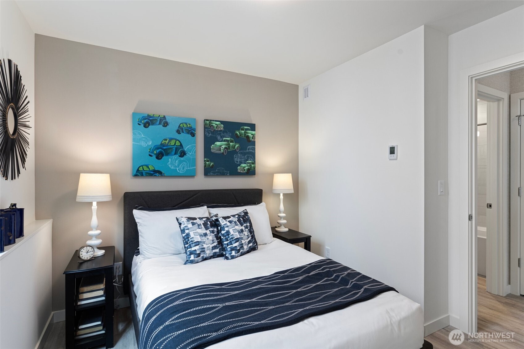 2529 29th Avenue South, Unit A Seattle, WA 98144 - Photo 3 of 21 a bedroom with a bed and a window