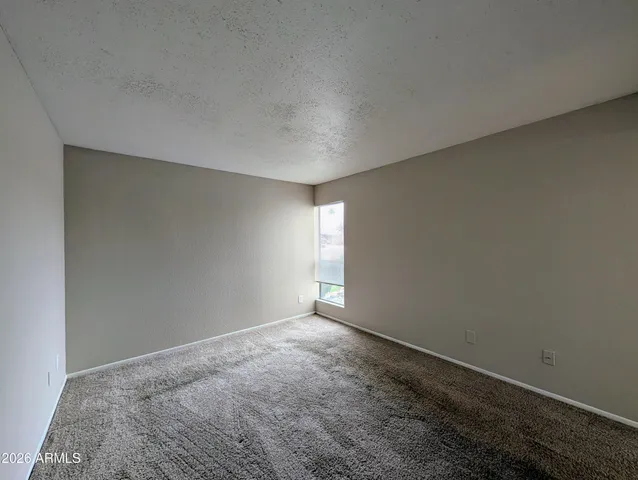 an empty room with sliding door