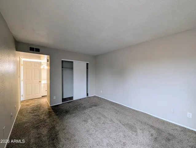 a view of swimming pool with chairs