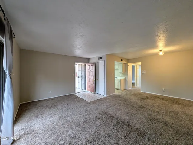 a view of an empty room with window