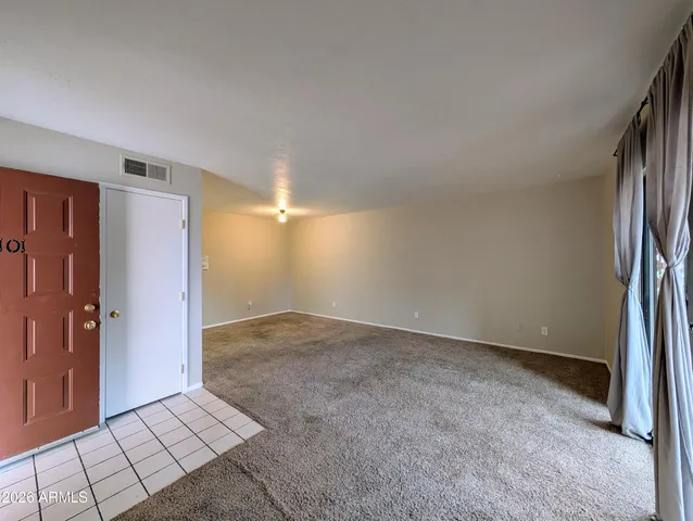 an empty room with windows