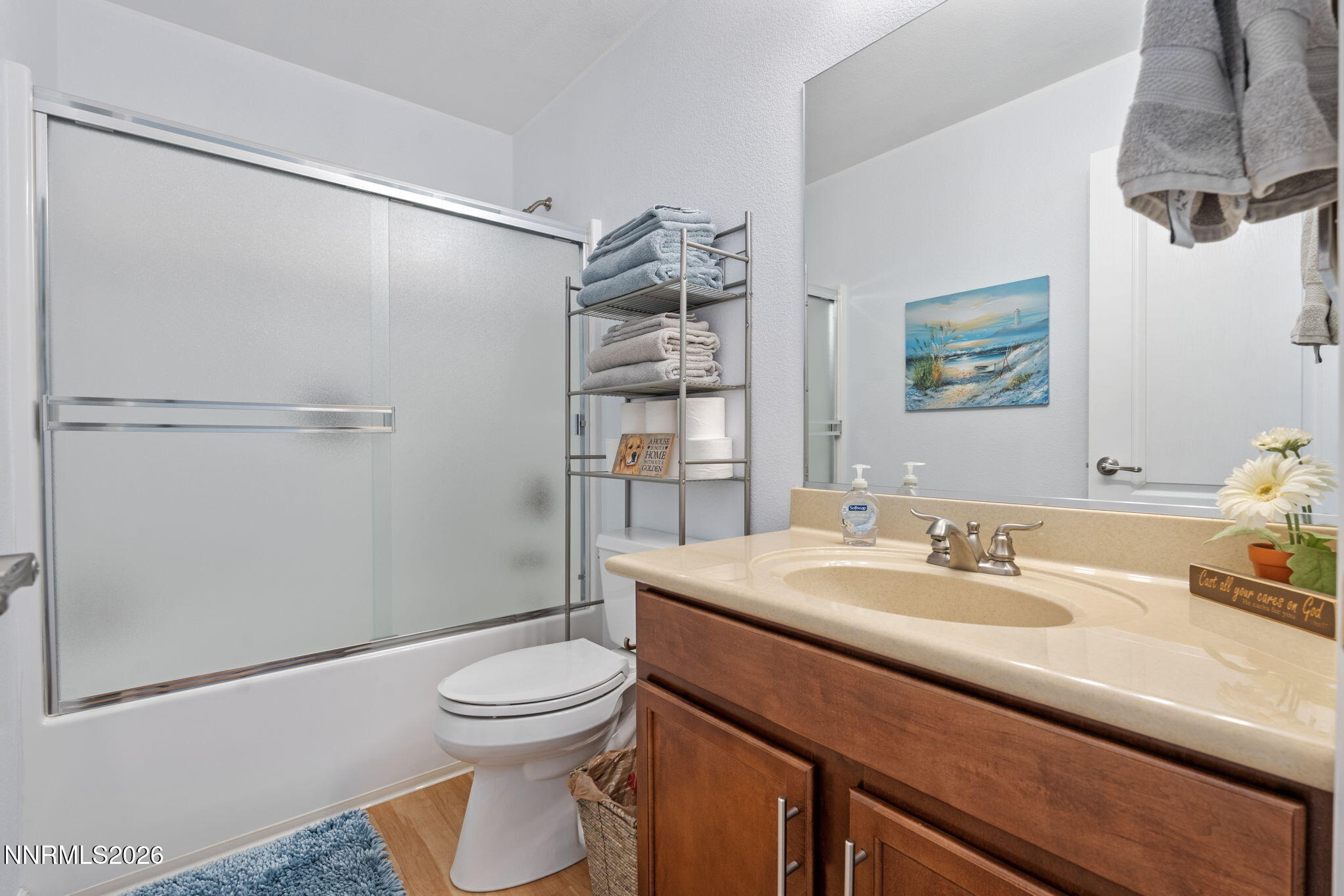 18324 Panda Bear Court Reno, NV 89508 - Photo 21 of 44 a bathroom with a sink toilet and shower