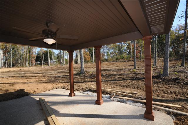 123 Legends Ridge Drive, Unit 12 Lebanon, TN 37090 - Photo 12 of 13 View of backyard from covered patio.