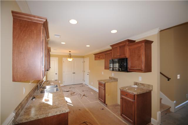 123 Legends Ridge Drive, Unit 12 Lebanon, TN 37090 - Photo 5 of 13 Kitchen with beautiful cabinets,nook and pantry.