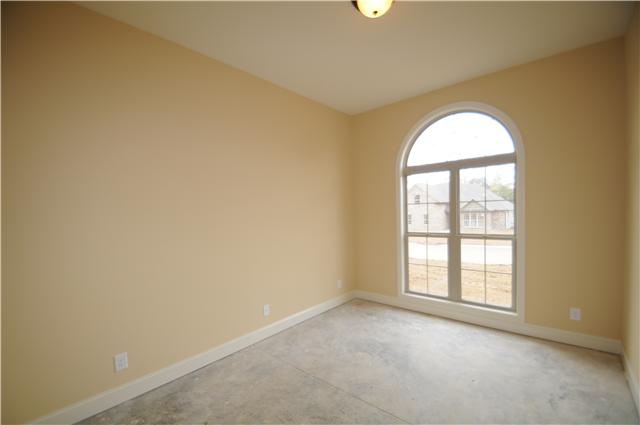 123 Legends Ridge Drive, Unit 12 Lebanon, TN 37090 - Photo 10 of 13 Bedroom with arched window allows for plenty of natural light