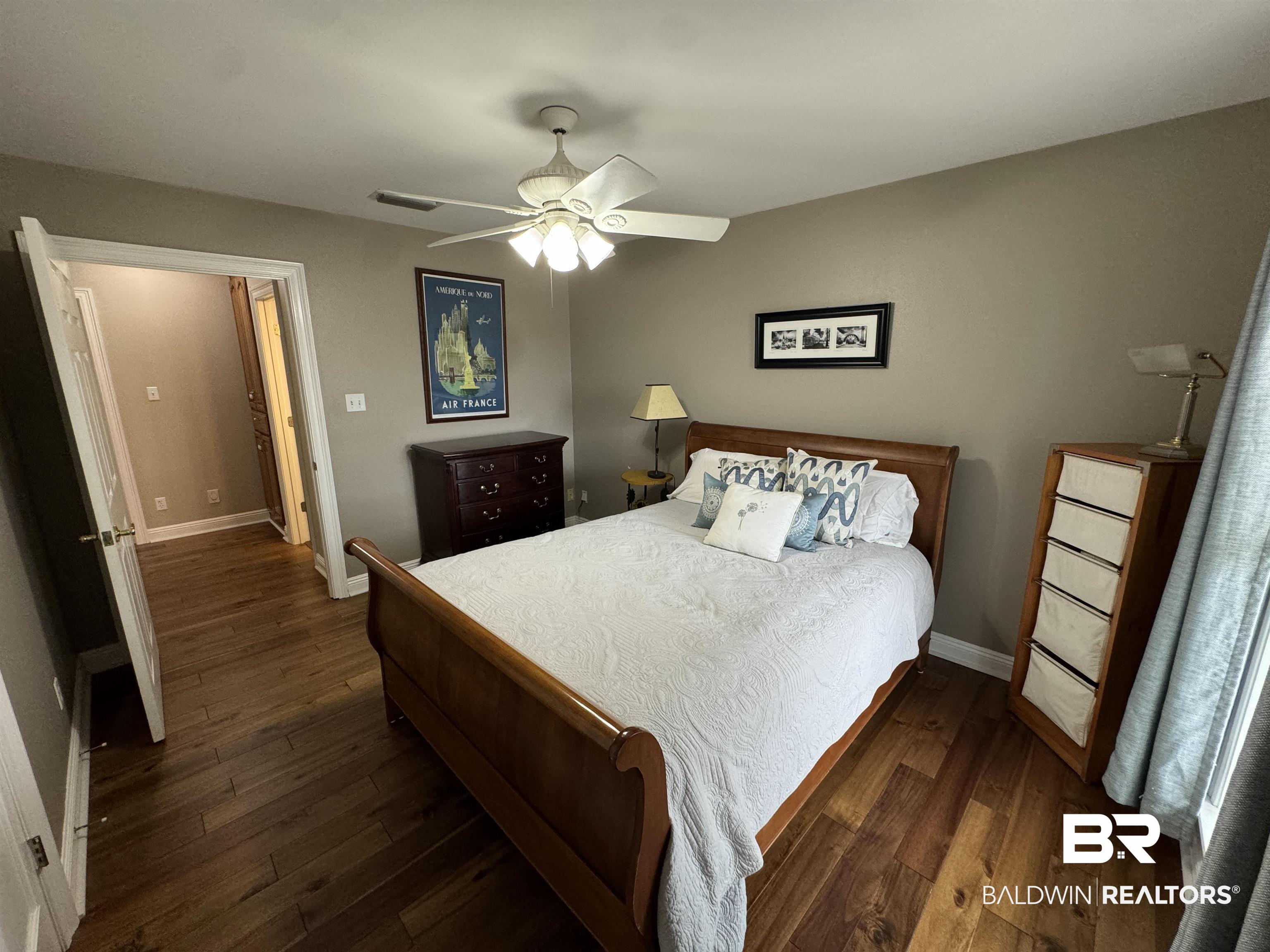 15165 Daugherty Road Foley, AL 36535 - Photo 33 of 70 Bedroom featuring dark hardwood / wood-style floors and ceiling fan