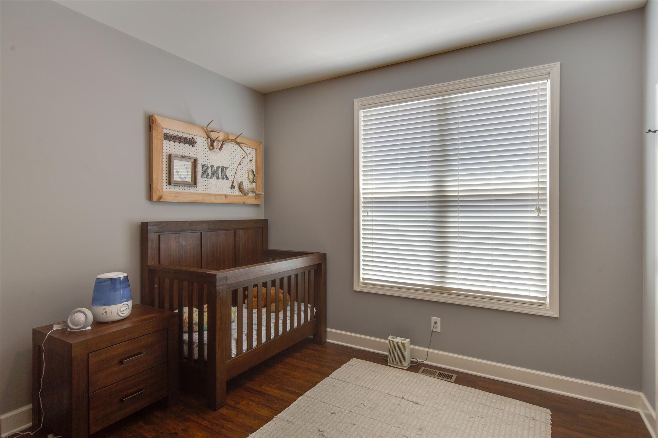 1045 North Corinth Road Portland, TN 37148 - Photo 15 of 29 a bedroom with windows