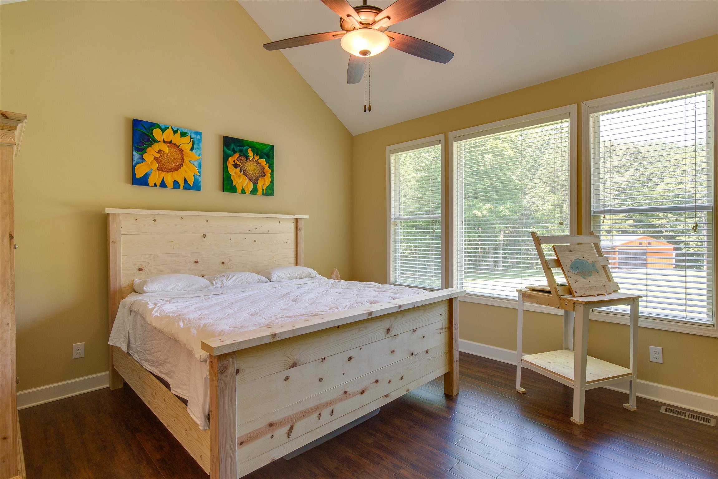 1045 North Corinth Road Portland, TN 37148 - Photo 18 of 29 a bedroom with a bed and a desk