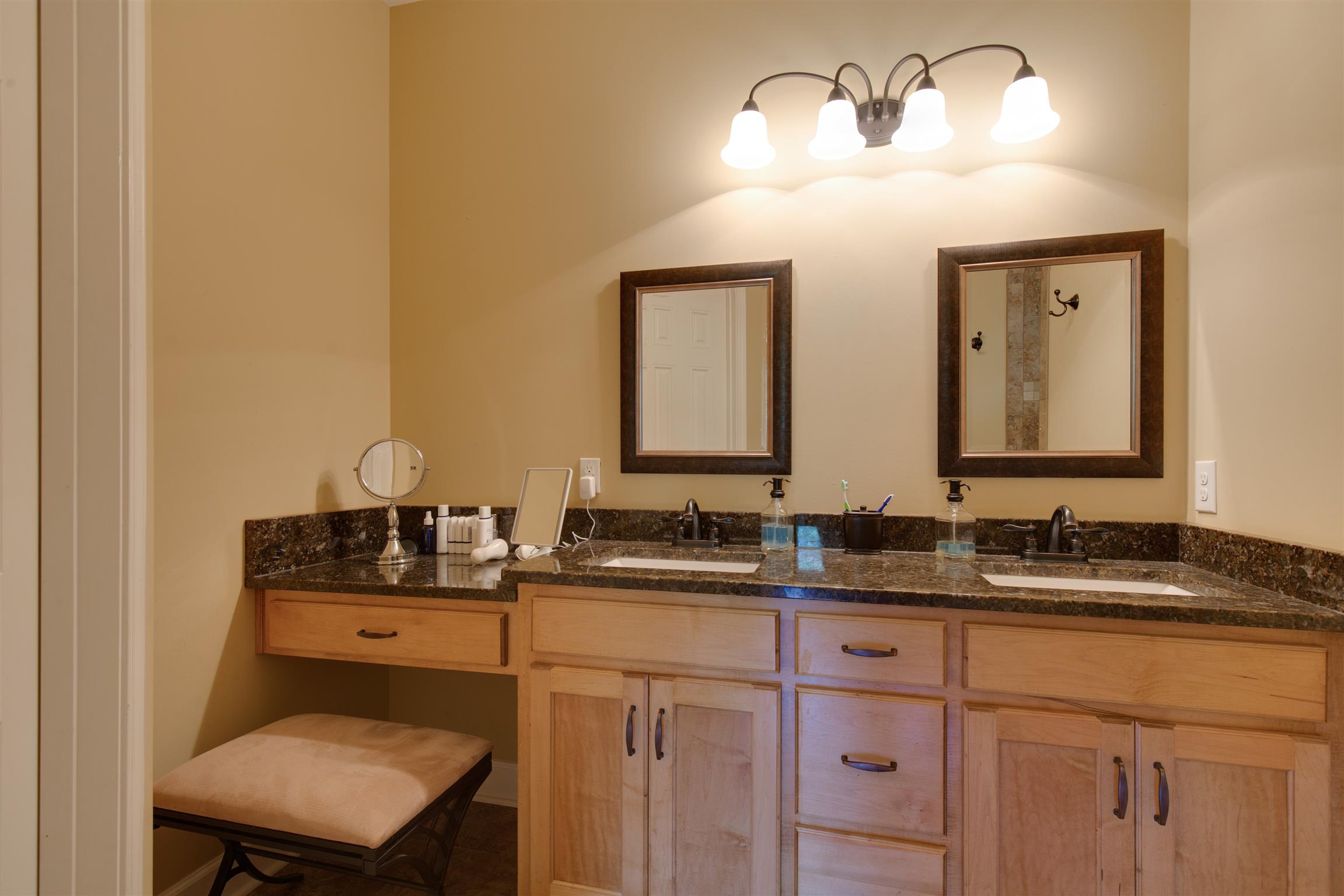 1045 North Corinth Road Portland, TN 37148 - Photo 20 of 29 a bathroom with a sink and a mirror