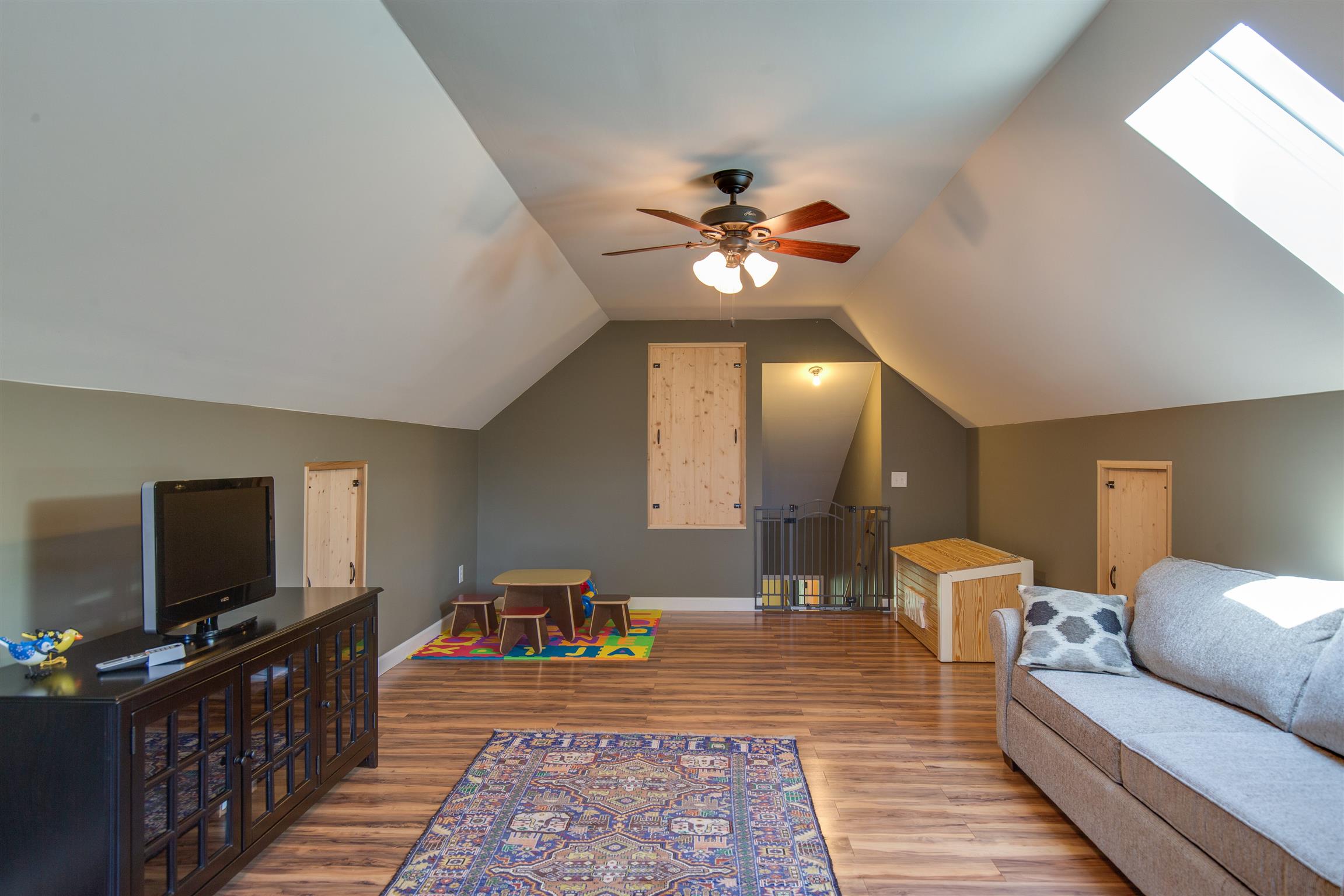 1045 North Corinth Road Portland, TN 37148 - Photo 22 of 29 a living room with furniture and a flat screen tv