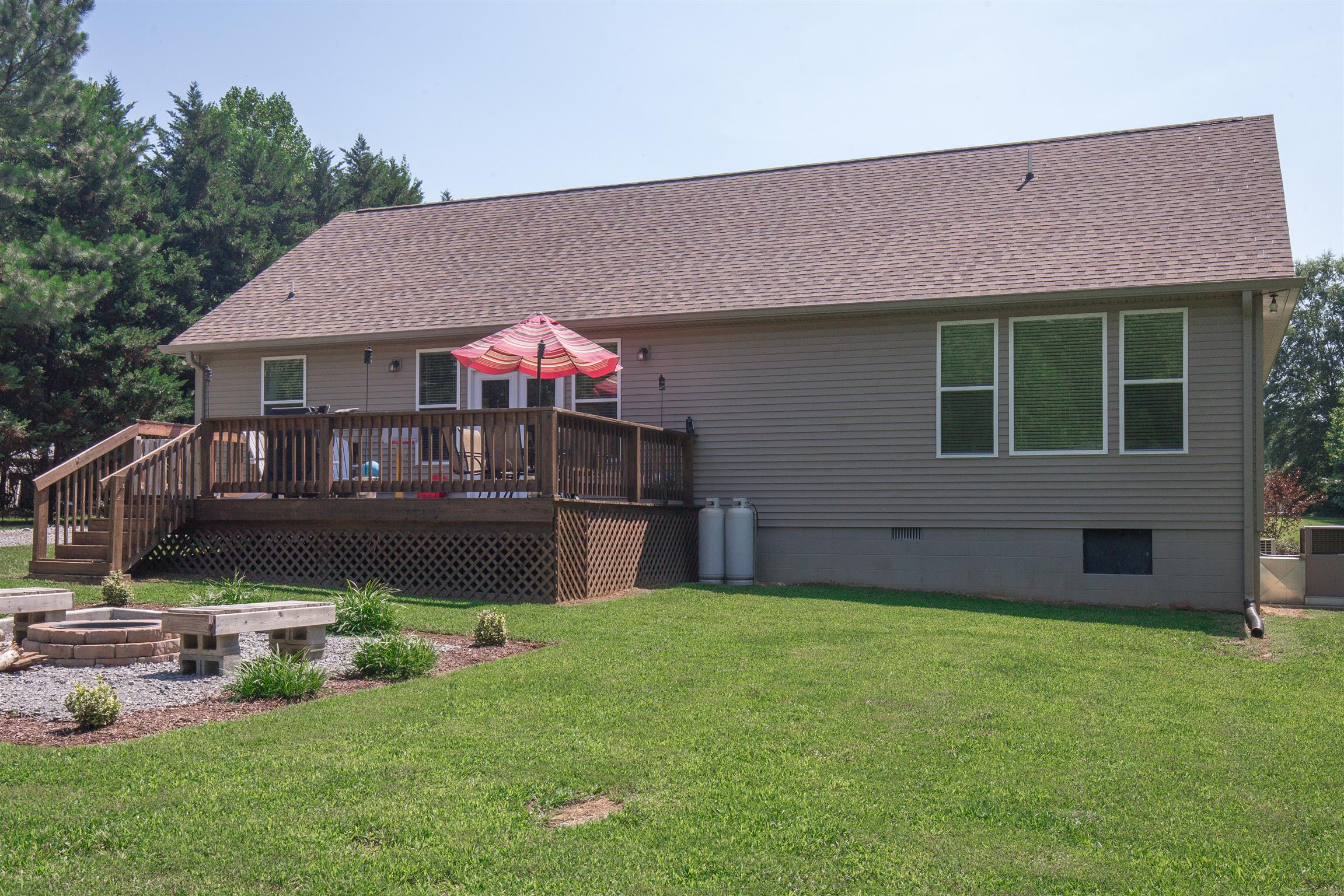 1045 North Corinth Road Portland, TN 37148 - Photo 25 of 29 a front view of house with yard and green space