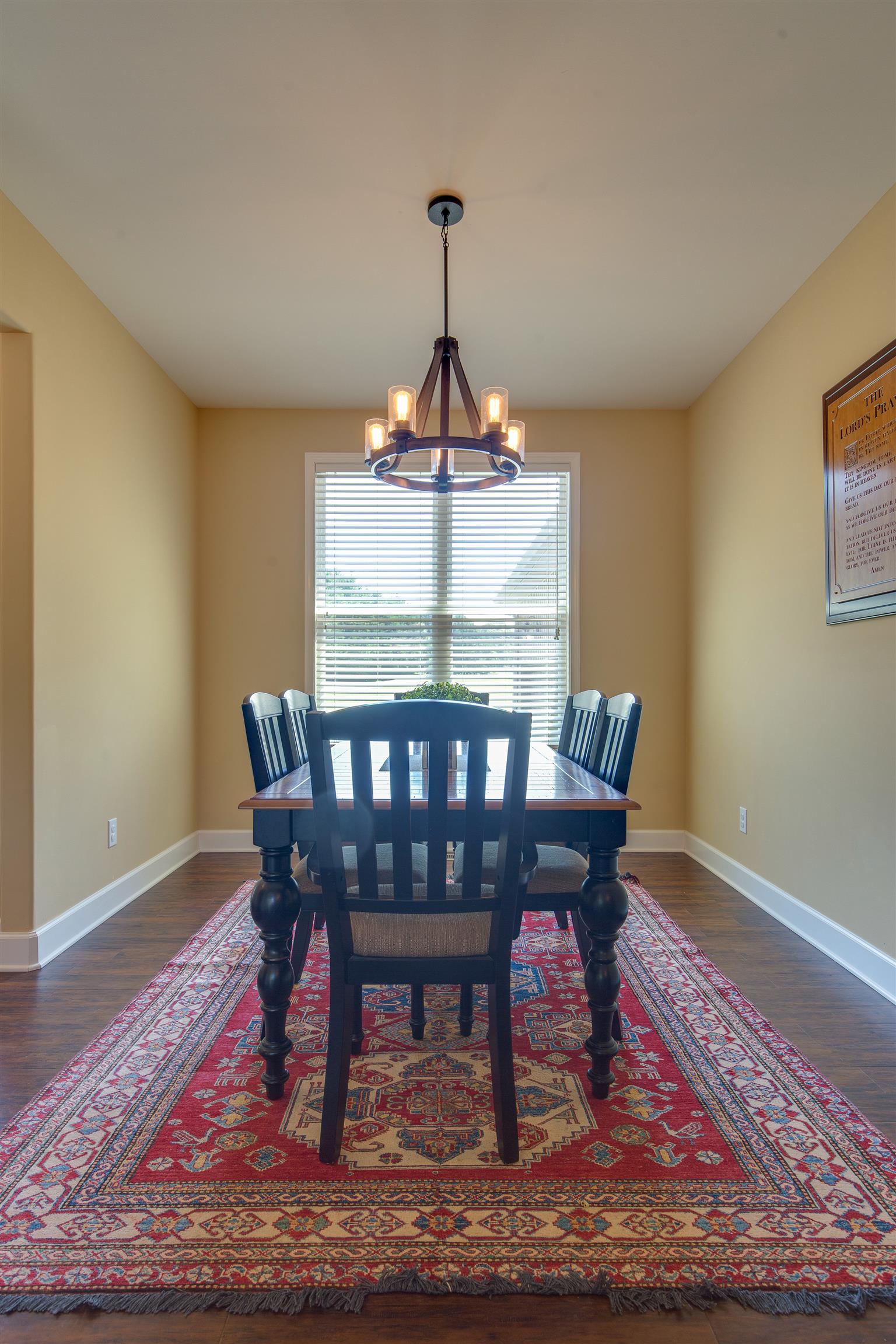 1045 North Corinth Road Portland, TN 37148 - Photo 9 of 29 a view of a dining room with furniture window and wooden floor