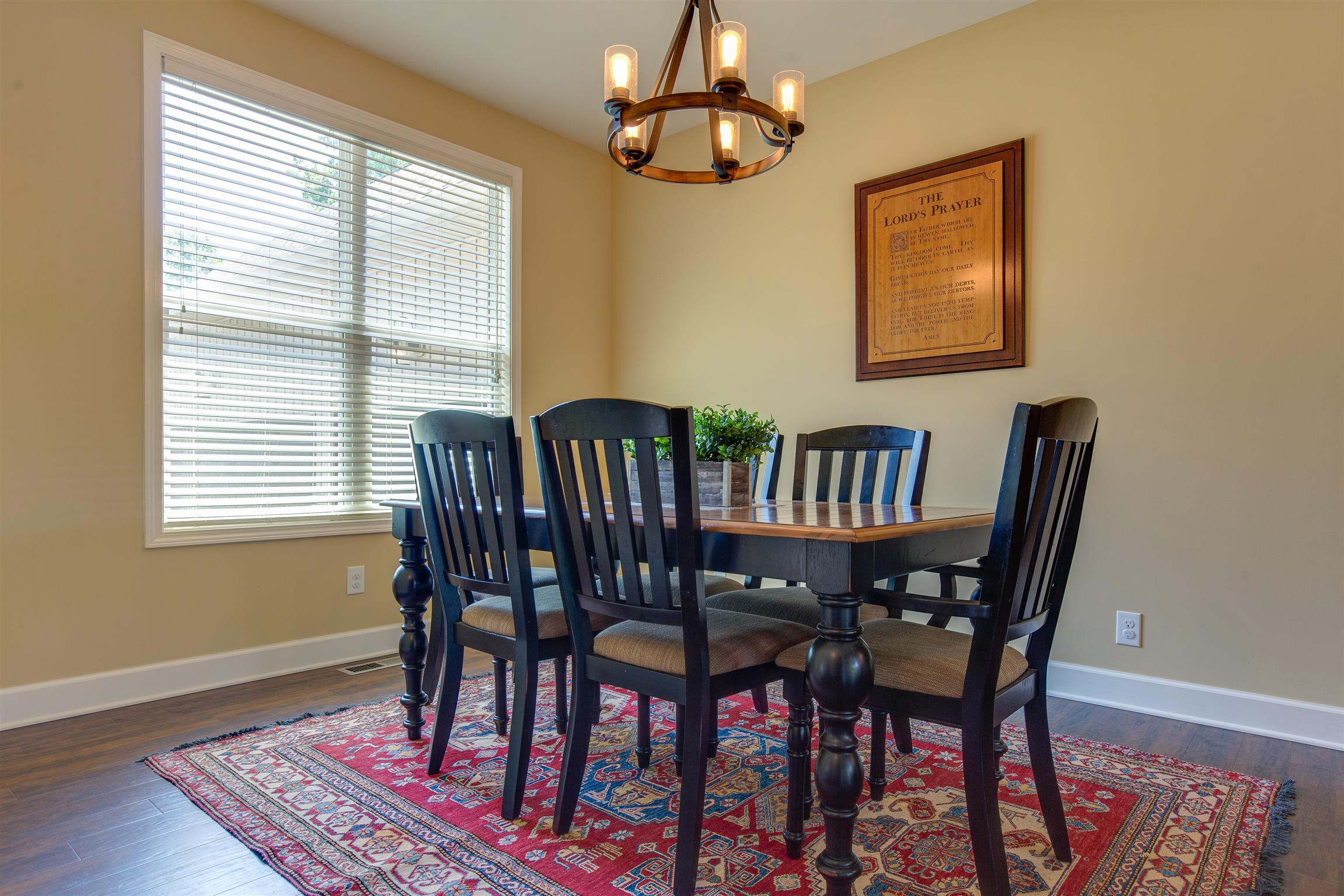1045 North Corinth Road Portland, TN 37148 - Photo 10 of 29 a view of a dining room with furniture window and wooden floor