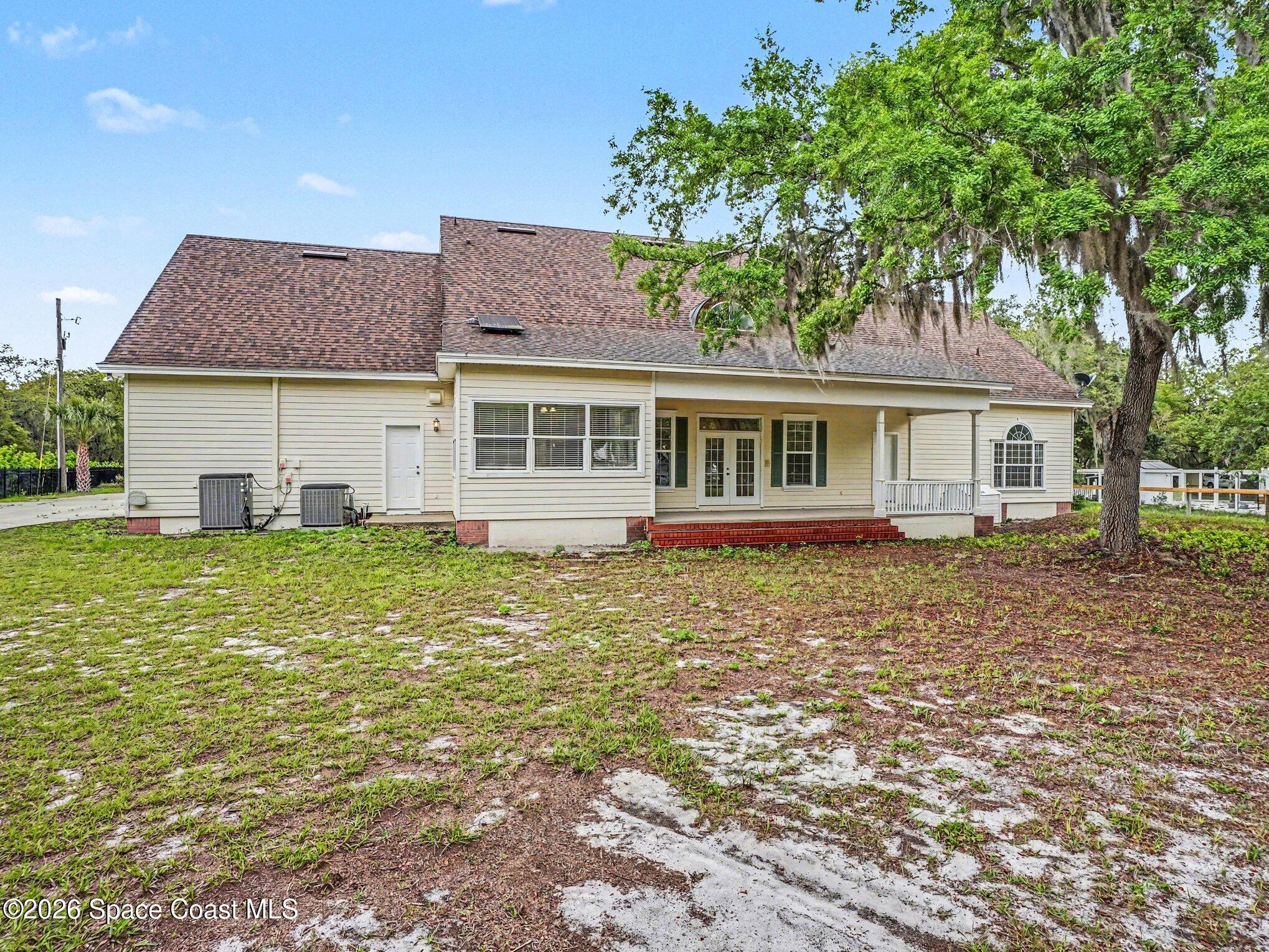 11940 Kirby Smith Road Orlando, FL 32832 - Photo 26 of 39 a house view with a garden space