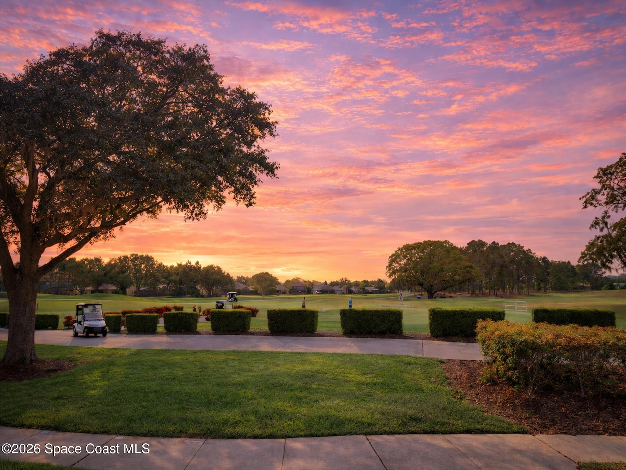 11940 Kirby Smith Road Orlando, FL 32832 - Photo 30 of 39 a view of a lake with houses in the background
