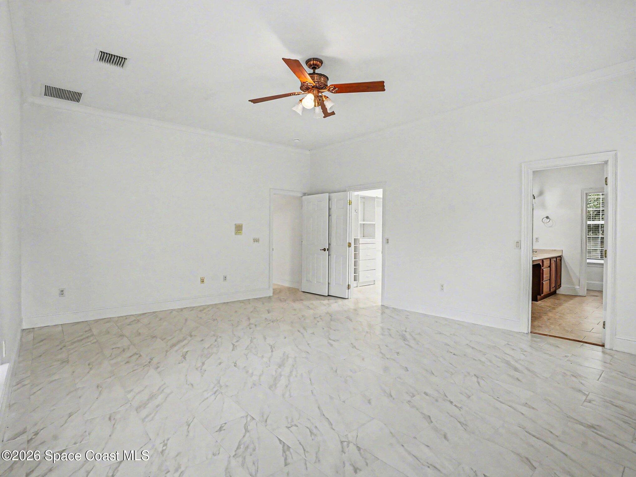 11940 Kirby Smith Road Orlando, FL 32832 - Photo 10 of 39 wooden floor in an empty room