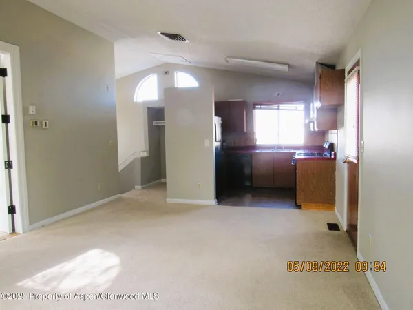 a view of a kitchen with a sink
