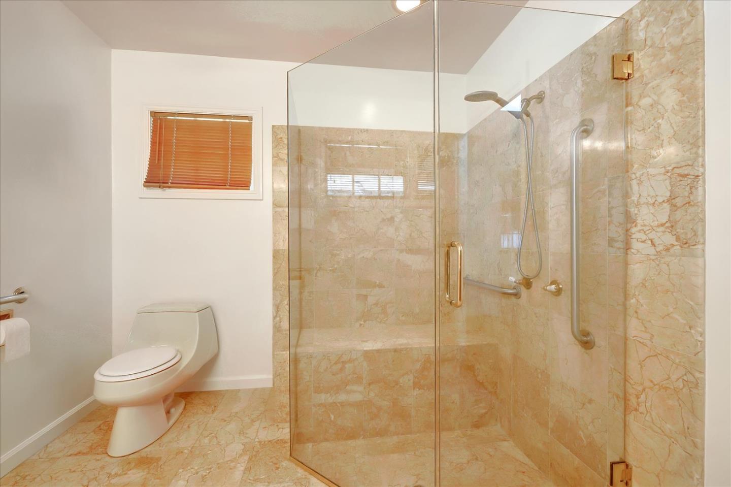 Toyon Road Atherton, CA 94027 - Photo 14 of 21 a white toilet sitting next to a bathroom sink